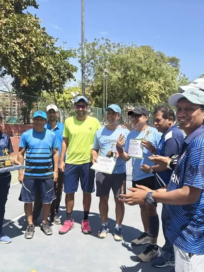 A happy group of winners and participants at the Ad In Tennis Open. The energy and sportsmanship were fantastic throughout the event.