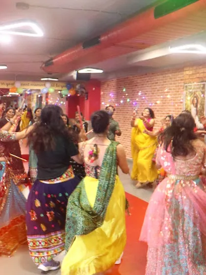 A candid shot of the dance floor, showing everyone lost in the music and movement. This is the sign of a truly successful dance party.