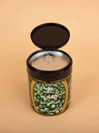 An open-lid shot of the Tenti Dela Pickle.