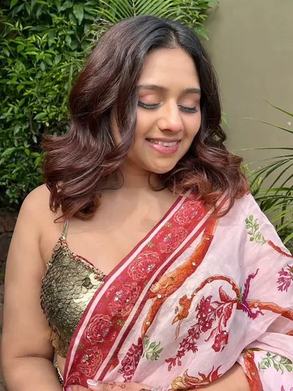 A little sparkle for this daytime look. The soft glam makeup with a gold sequin blouse is perfect for a guest at a Mehendi or Haldi.