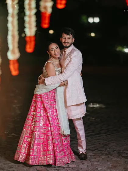A happy couple portrait from the Sangeet. The bride's natural and glowing makeup looks just as beautiful in candid moments as it does in posed photos.