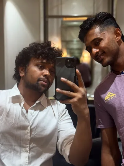 A mirror selfie with Sai Sudharsan. I always make sure my clients are happy with the final result.