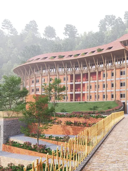 This render shows the university's architectural response to the mountainous site, with buildings nestled into the hillside. The use of natural materials and extensive landscaping helps the campus merge with its environment, minimizing its visual and ecological impact.