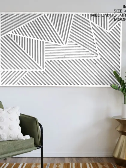 Finished in 'Moon White', this geometric art piece offers a subtle, textural element to a room. It's perfect for creating a bright, airy feel while still providing a strong visual anchor.