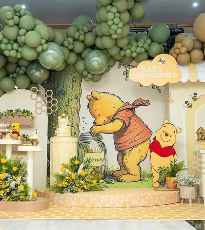A full view of a Winnie the Pooh themed baby shower. The gentle theme and color palette are perfect for welcoming a new baby.