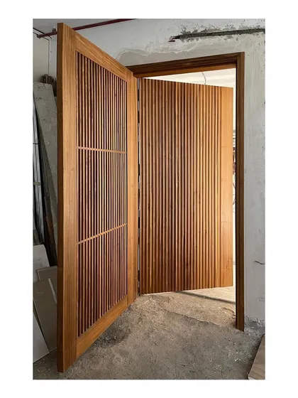 The entry interface of a home should be impressive. This main door and screen, built in solid teak wood with a natural matte finish, provides a warm and dramatic welcome.