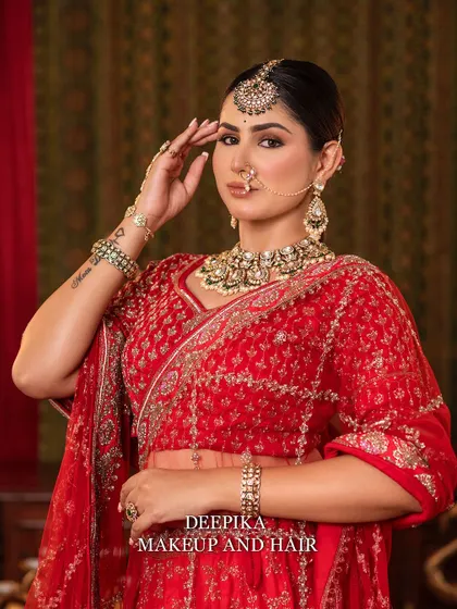 A confident pose from the bride, looking directly at the camera. This shot captures her strong personality and the power of a good bridal look.