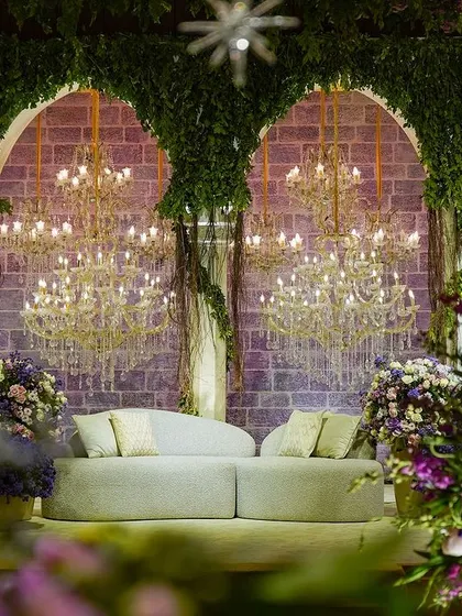 A duplicate of image 361, offering a beautiful, flower-framed view of the main stage.