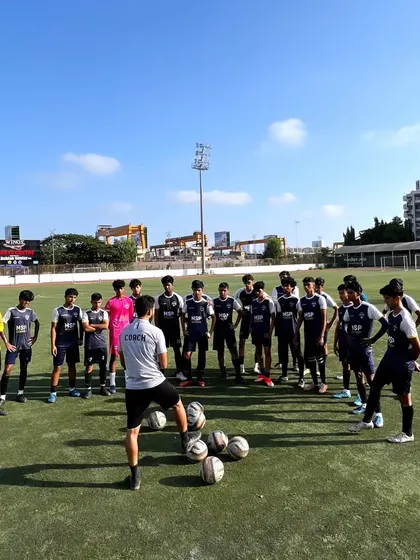 A coach addresses the team, laying out the plan for a training session focused on chasing greatness.