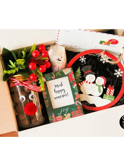 The complete 'Holly Jolly' hamper, a perfect and affordable Secret Santa gift.