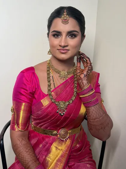 A beautiful candid of Janaki. The makeup is soft and natural, allowing her to feel comfortable and confident.