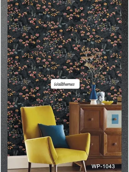 A living room with a dark wallpaper featuring a dense pattern of small, colorful flowers.