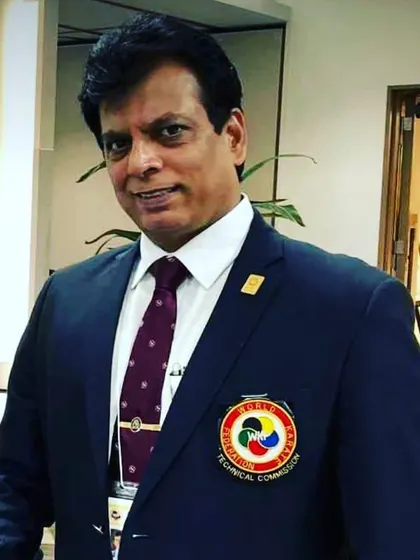 A portrait of my teacher, Hanshi Bharat Sharma, representing the World Karate Federation. His leadership extends beyond our dojo and onto the world stage.