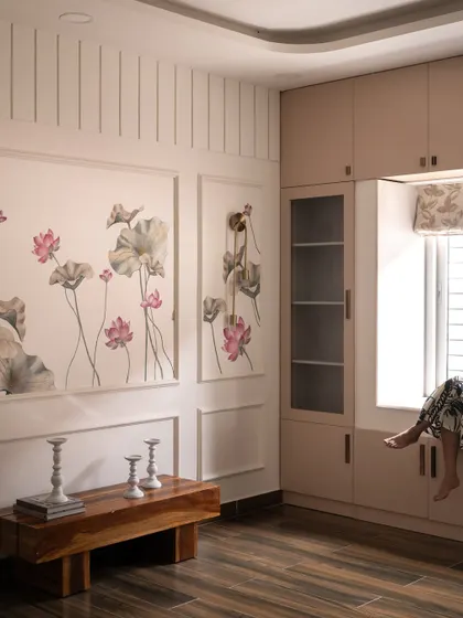 This versatile multi-purpose room on the second floor of 'Project Varnika' is designed for exercise and relaxation. The floral murals and bay window seating create a bright and contemporary space.