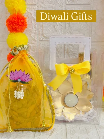 This gift set includes a transparent gift bag and a matching yellow organza potli, both filled with festive goodies for a coordinated look.