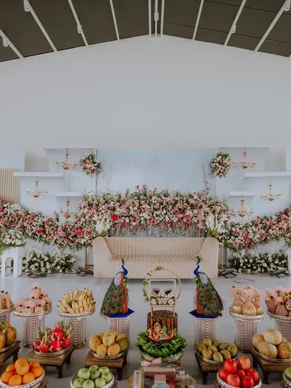 A lavish display of fruits and sweets (Thottil Shastra) for a traditional ceremony. The presentation is as important as the items themselves.