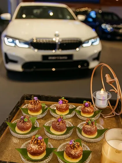 A tray of decadent desserts presented at the BMW 2 Series event. These small, flavourful bites were designed to be easily enjoyed while mingling, with the stunning new car as the backdrop.