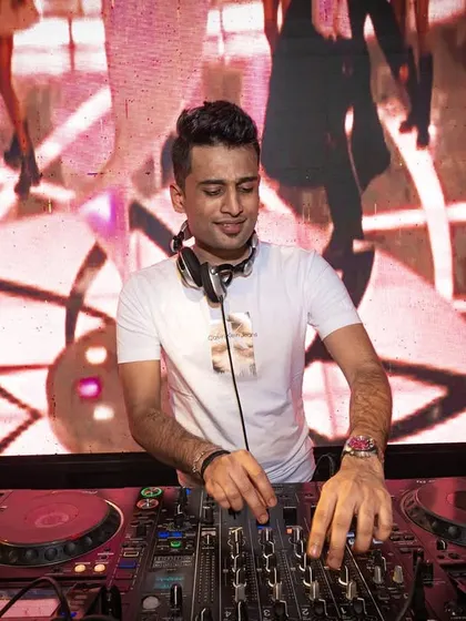 In the zone at Elrow Pune, mixing tracks with my custom audio-visuals on the big screen. I love creating a seamless blend of sound and sight.
