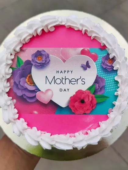A lovely Mother's Day cake with a floral edible image. A sweet treat to celebrate all the amazing mothers out there.