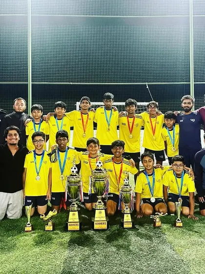 A group photo of all our participating teams and coaches at the All Star Super Cup. These events build a strong sense of community within our academy.