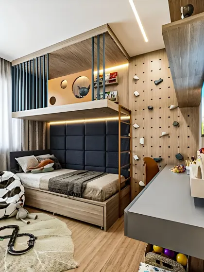We love creating kids' rooms that are both fun and practical. This design features a custom loft bed to maximize floor space, a built-in study desk, and a fun rock-climbing wall for play, all tied together with a cohesive wood and blue color scheme.