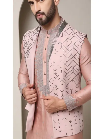 A close-up of the 'Mystic Rose' set, revealing the layers. The embroidered V-cut jacket opens to show the detailed placket of the inner kurta, demonstrating my focus on layered complexity.