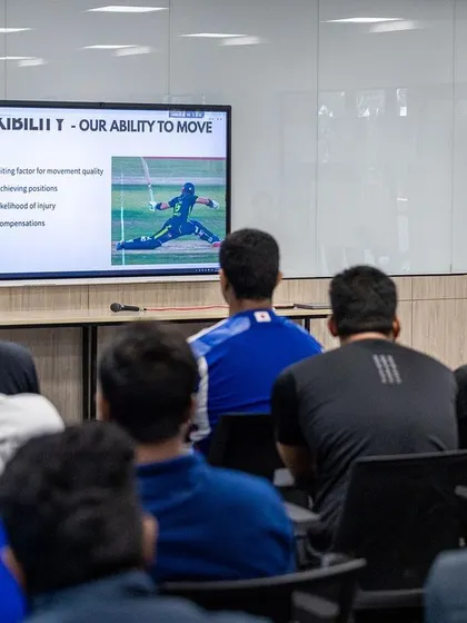 A presentation slide on flexibility highlights its importance as a limiting factor in movement quality and injury risk. Our conferences cover all aspects of athletic preparation.