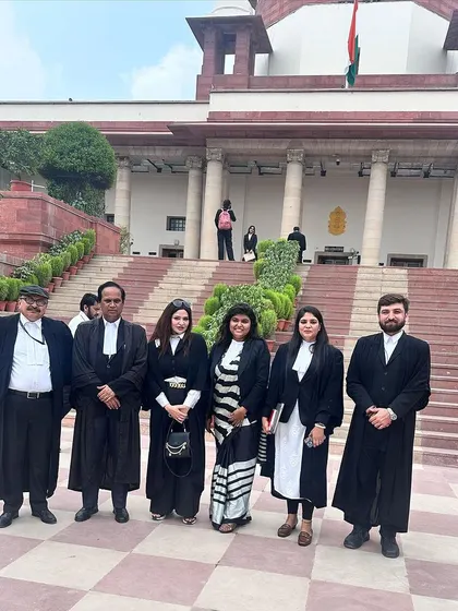 A group photo outside the magnificent Supreme Court of India during the book launch event. These moments of community and shared knowledge are what strengthen our profession.