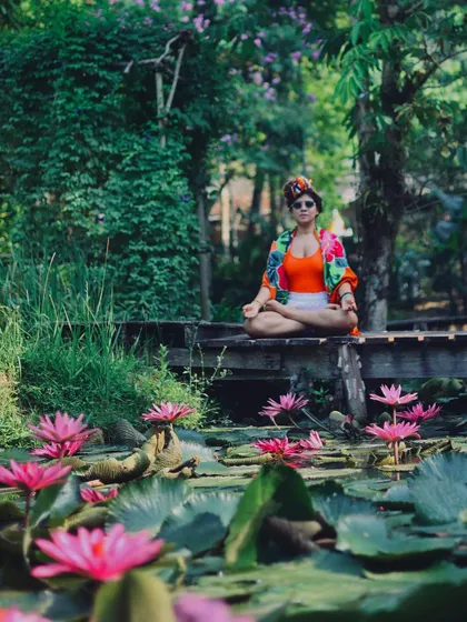 Meditating among the pink lotus, or 'Padma'. This flower is a powerful spiritual symbol of rebirth, purity, and enlightenment, and its presence in my life feels like a sign of grace and synchronicity on my path.
