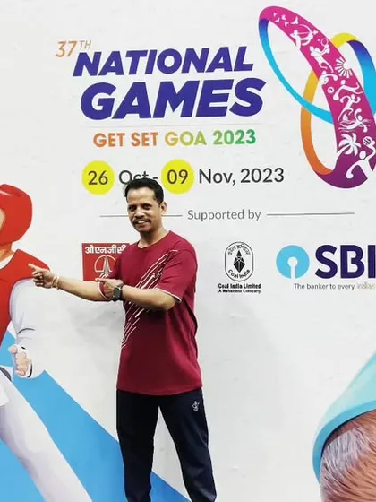 Posing with the official mascot and branding at the National Games 2023 in Goa. It was an honor to be part of this major national sporting event.