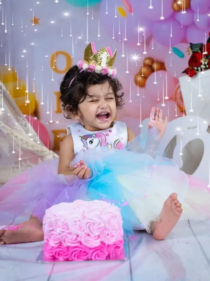 Sometimes the cake is just so exciting you have to shout about it. Capturing the full range of emotions, from quiet curiosity to loud excitement, is what makes these sessions special.