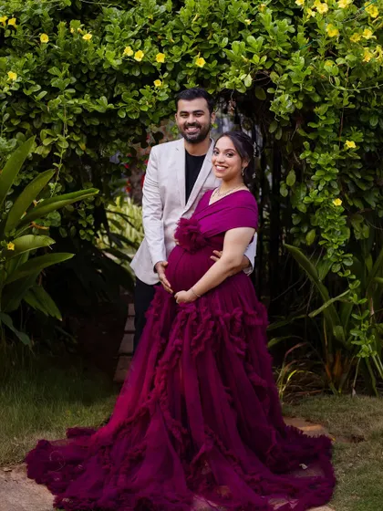 A duplicate of 155, showing a happy couple in a garden setting.