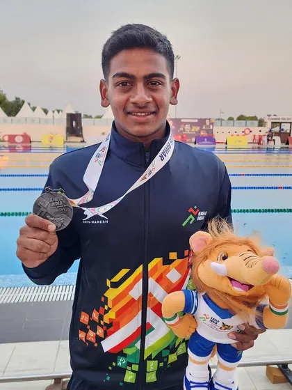 Sampath Gotteti with his silver medal from the 800m Freestyle.