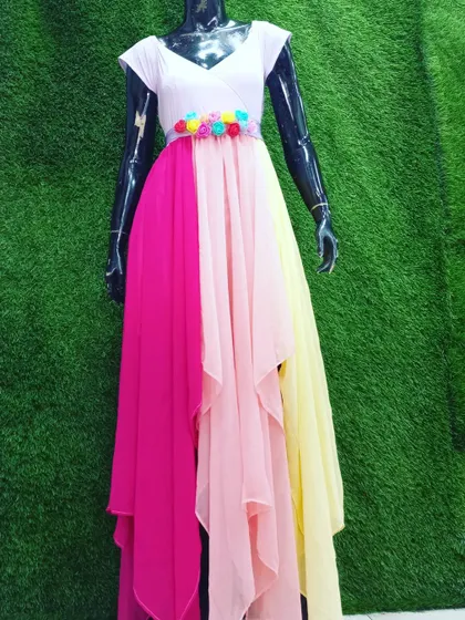 A look at my colorful rainbow gown on the mannequin. The floral belt adds a cute touch to this multi-colored, layered dress.