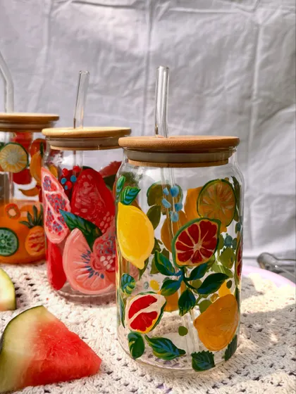 A collection of our fruity summer sippers, each one bursting with color and hand-painted details.