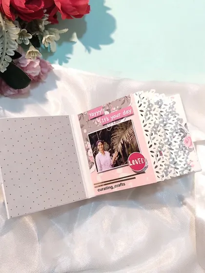 Another view of the lace-edge pages, showing a spot for a birthday photo.