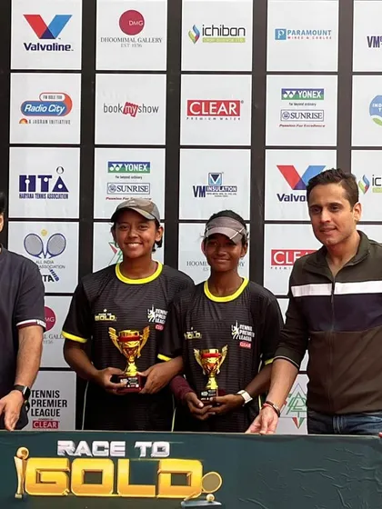 A collection celebrating Paavani Bisht's major victories, including her first All India CS U18 title and her success at the Tennis Premier League Delhi Masters.