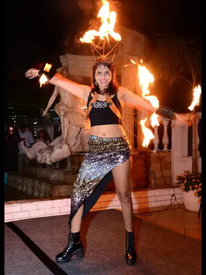 A powerful pose during a fire show at Mykos. My performances are a blend of skill and dance, designed to be an interactive experience, not just a set of tricks.