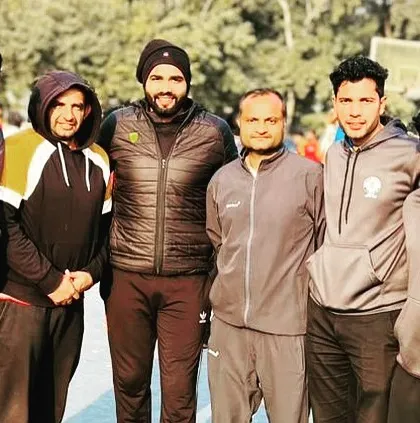 With fellow referees at the All India Civil Services Basketball Tournament. Officiating these games is a great way to stay connected to the competitive spirit of the sport.