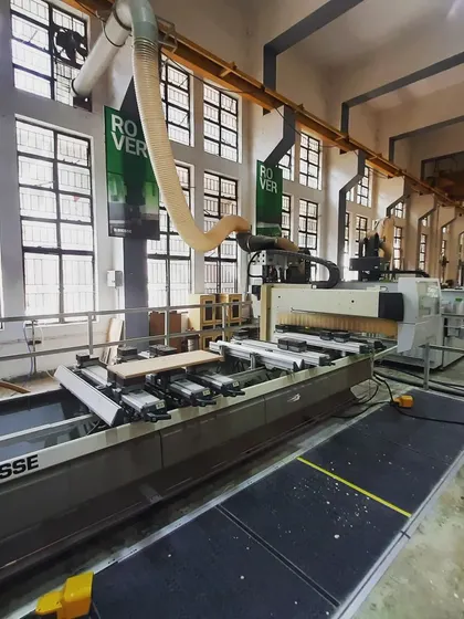 A view of our Biesse Rover CNC machine, a powerful and versatile tool that gives our students a competitive edge in the woodworking industry.