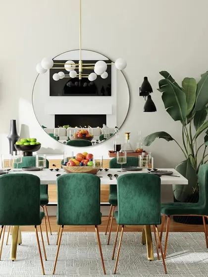A proposed dining room design with a bold and glamorous feel. The space features emerald green velvet chairs, a large circular mirror, and modern lighting fixtures.