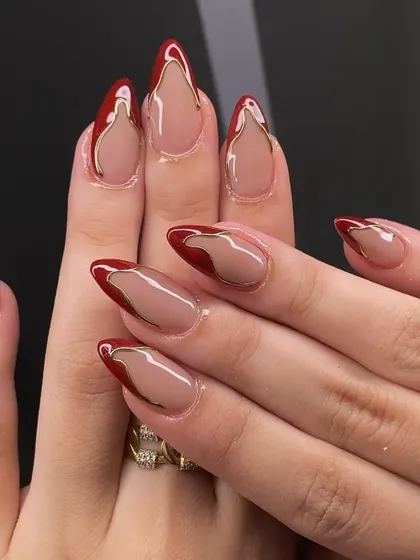 This abstract design is both modern and artistic. It features a sheer nude base with a deep red "lava lamp" effect, outlined in gold for a sophisticated and unique style.