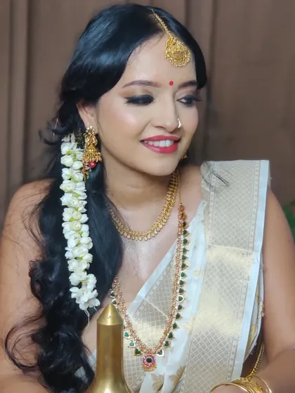 Another beautiful shot from the Kerala-inspired shoot, highlighting the soft glam makeup that enhances natural beauty.