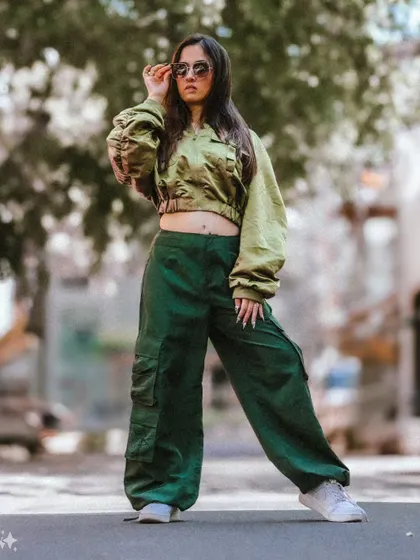 A full-body shot showcasing the entire streetwear outfit. The pose is strong and fashionable, ideal for a model's lookbook or a brand campaign.