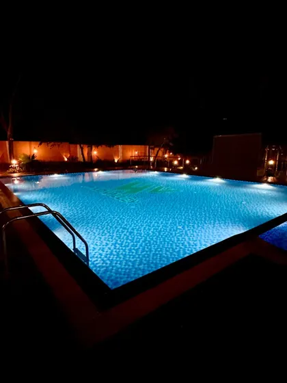Another shot of our pool at night, reflecting the resort lights. It's a peaceful and beautiful sight after a day of fun.