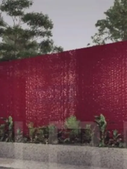 This is a duplicate of ID 21. Render of the Tiruppur Business Hub highlighting the vibrant red metal shell.