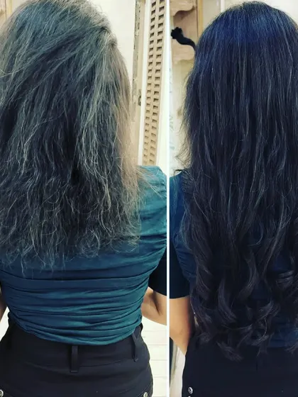 From frizzy and undefined to smooth, long waves. This transformation showcases a complete texture and length upgrade.