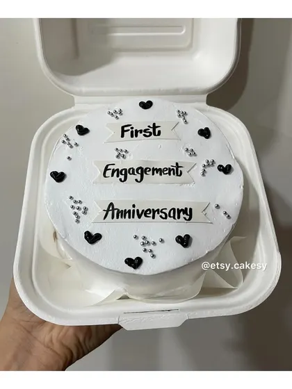 An elegant bento cake for a first engagement anniversary.