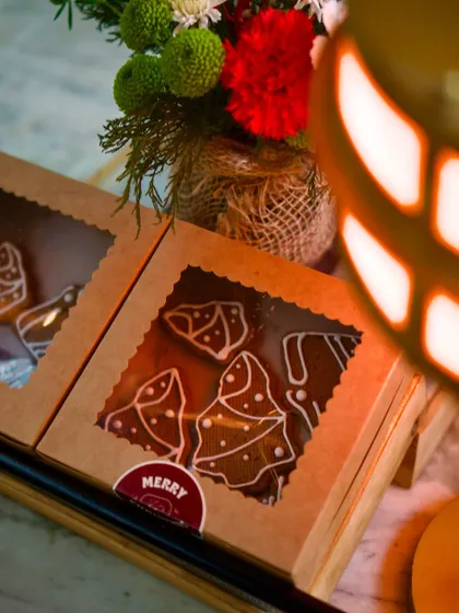 Boxes of homemade gingerbread cookies, given as festive takeaways. It's these little touches that make the holiday season at Lupa memorable.