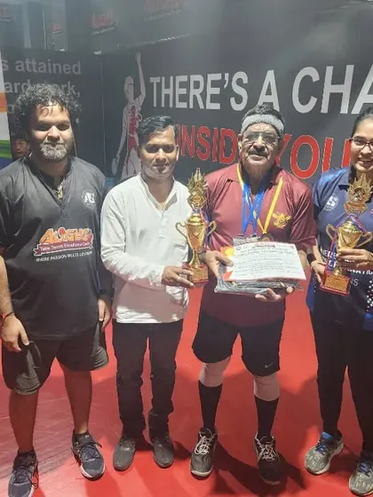 Celebrating with the winners in the veterans category. These players bring years of experience and skill to the table, making for some incredible matches.